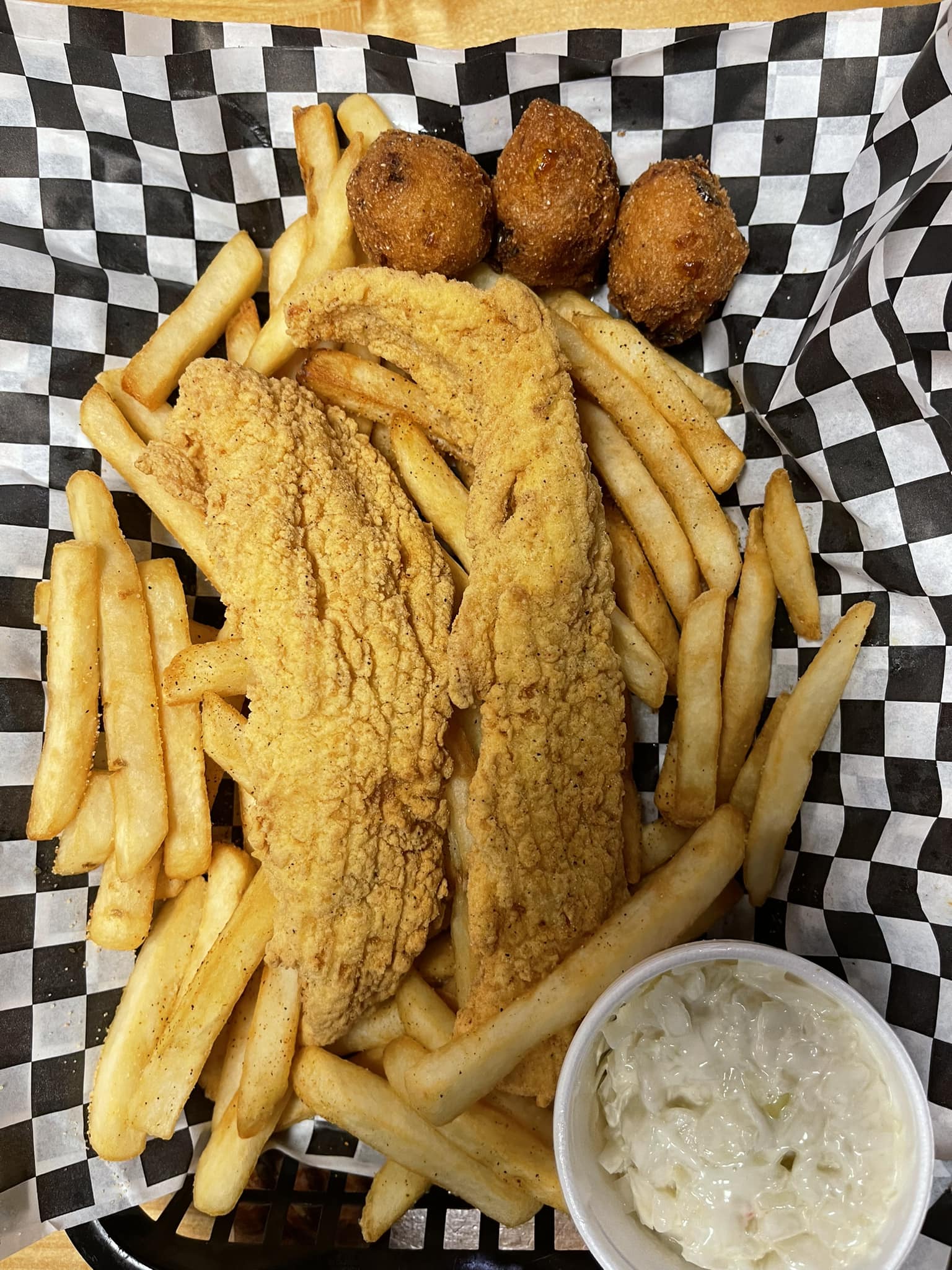 Fried Fish with french fries, hush puppies and coleslaw